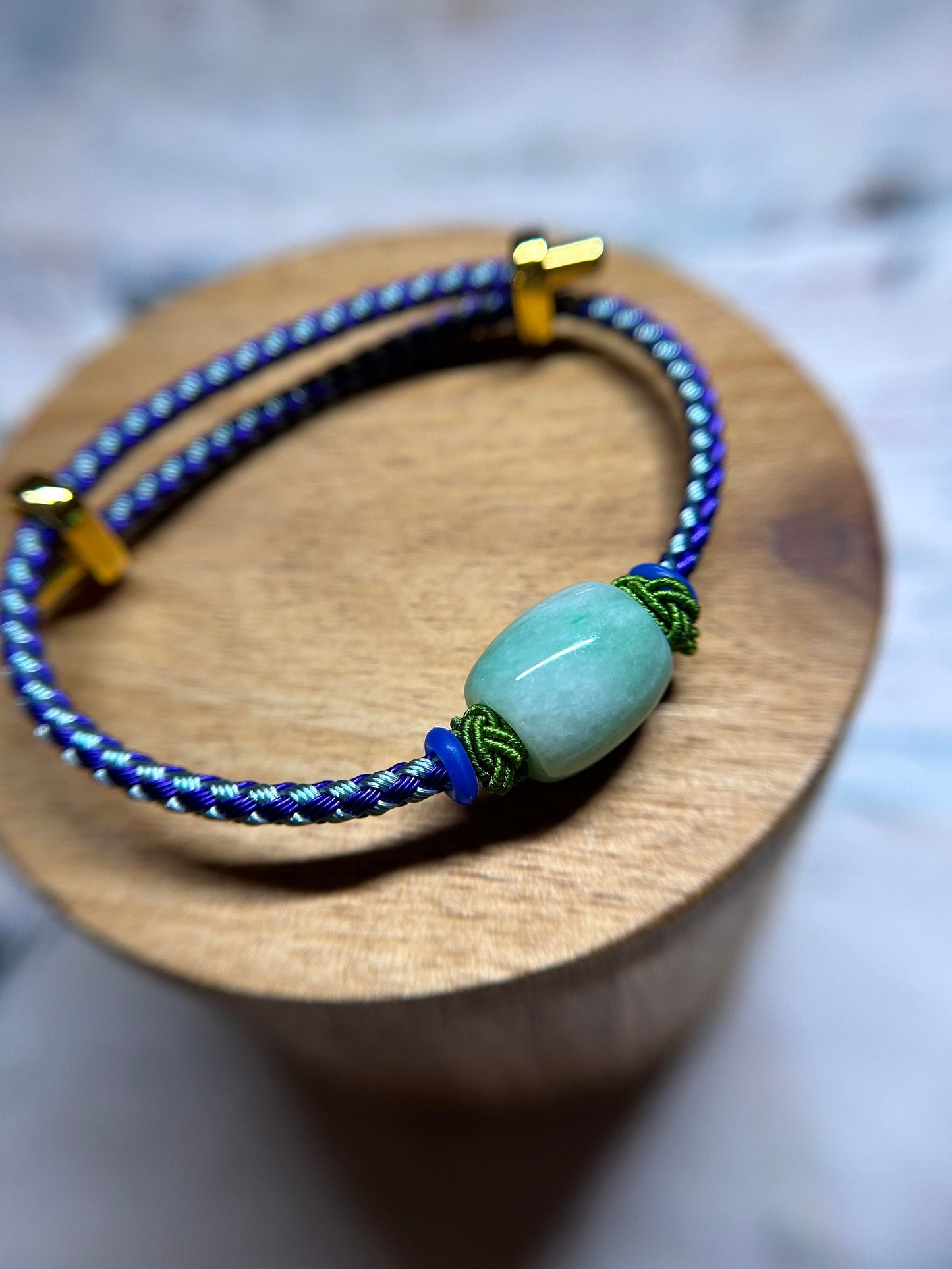 Grade A Natural Green Burma Jadeite Lu Lu Tong (barrel) with Braided Light and Dark Blue Nylon Bracelet