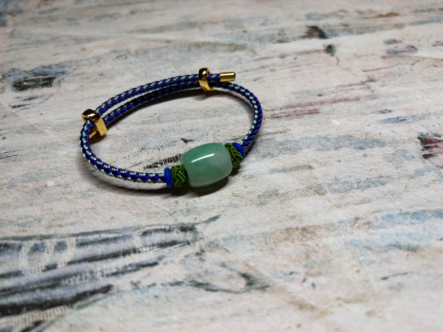 Grade A Natural Green Burma Jadeite Lu Lu Tong (barrel) with Braided Light and Dark Blue Nylon Bracelet