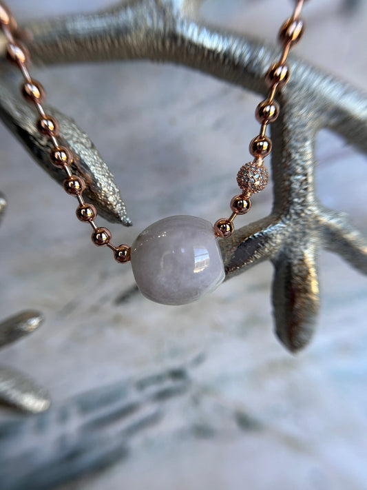 Grade A Natural light lavender Lu Lu Tong(barrel) with rose gold plated Sterling silver bracelet.