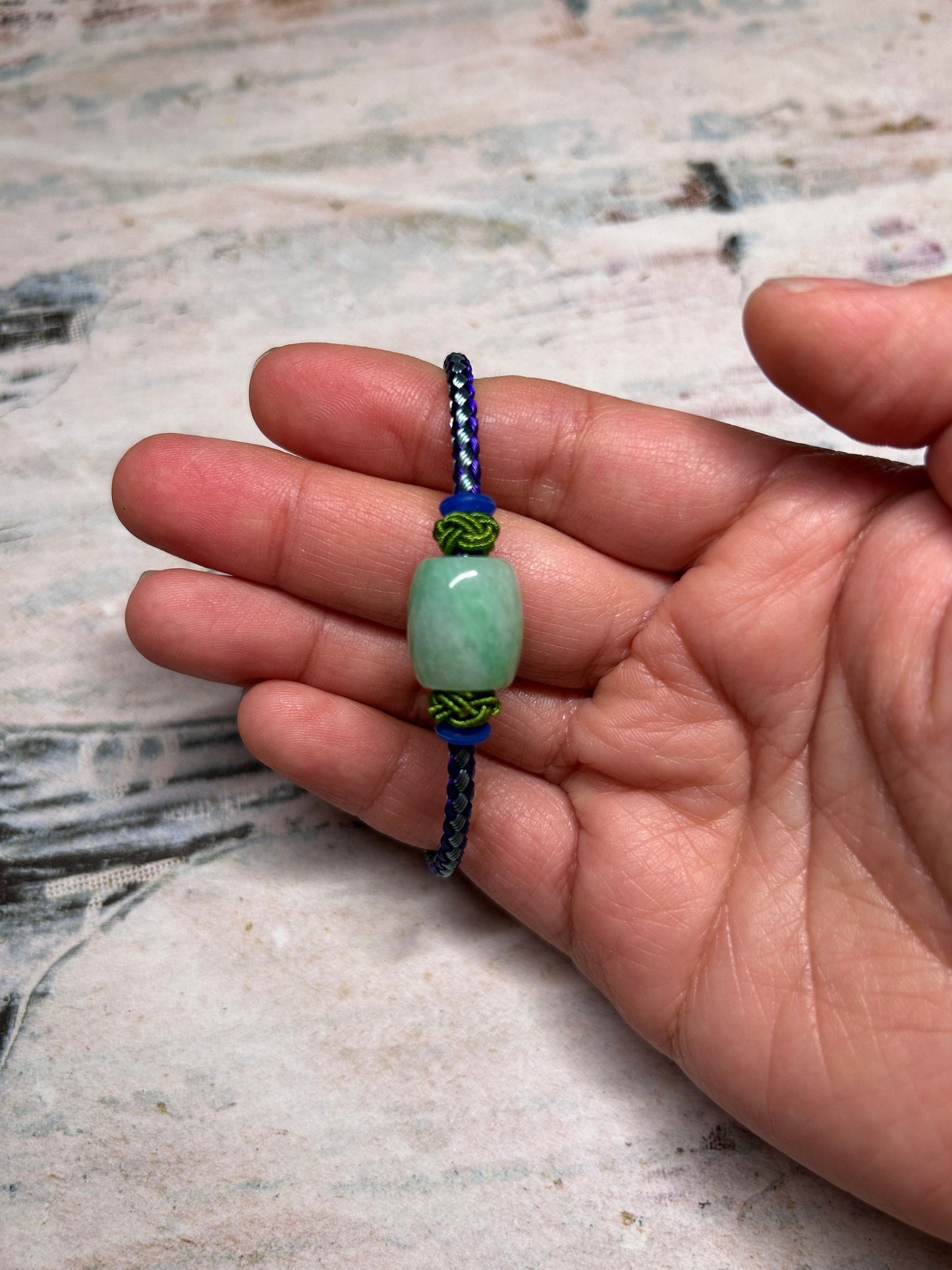 Grade A Natural Green Burma Jadeite Lu Lu Tong (barrel) with Braided Light and Dark Blue Nylon Bracelet