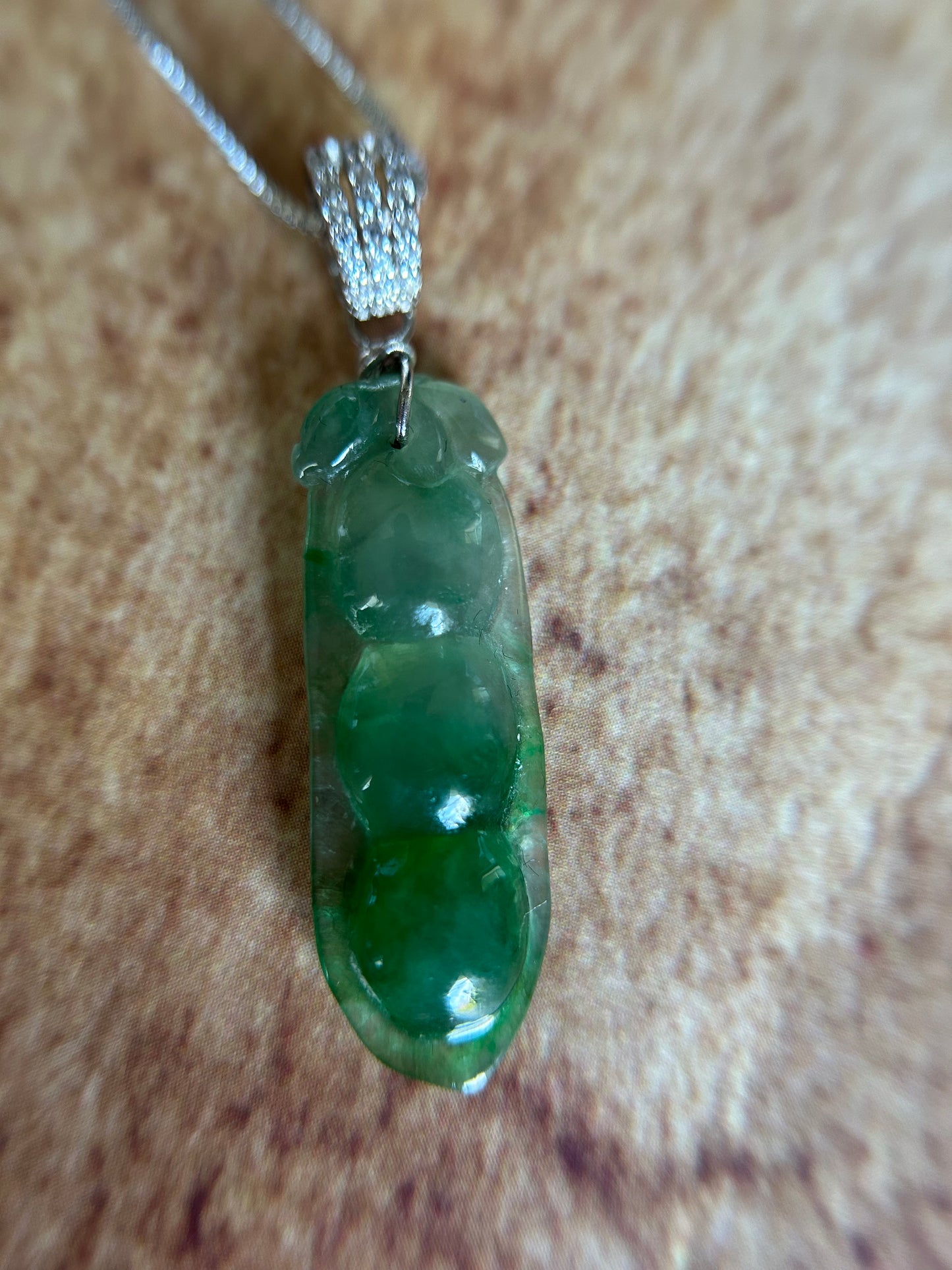 Grade A Natural Icy green Three peas in a pod Jadeite pendant. Translucent and natural ombré effect