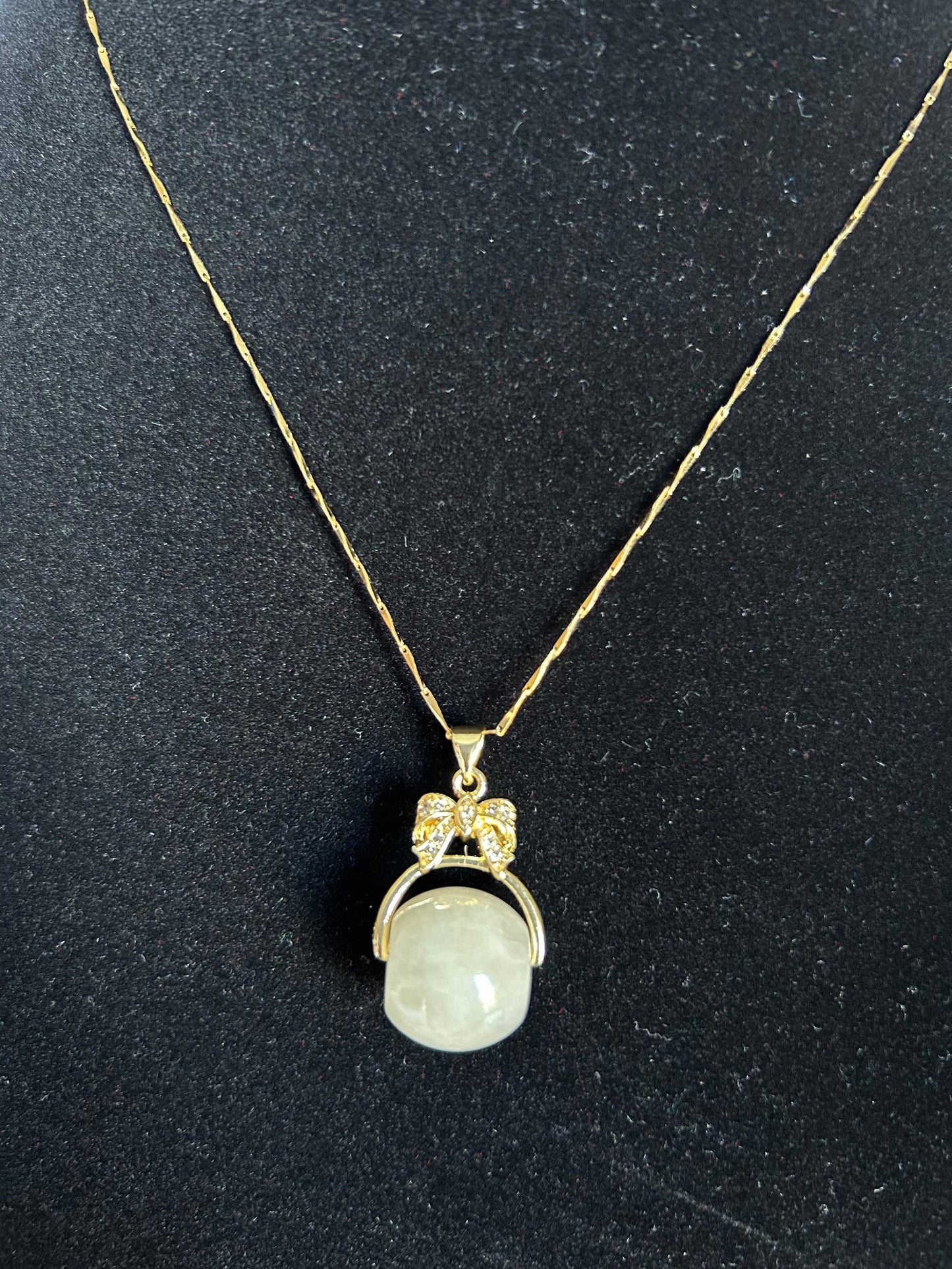 Grade A Natural light yellow luluton (barrel) Burmese jadeite with bow gold plated sterling silver pendant