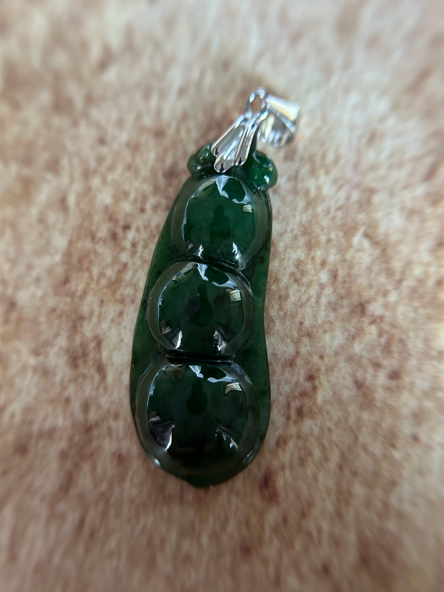 Grade A Natural deep green Three peas in a pod Jadeite pendant.