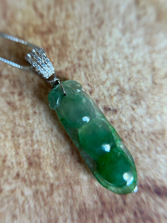 Grade A Natural Icy green Three peas in a pod Jadeite pendant. Translucent and natural ombré effect