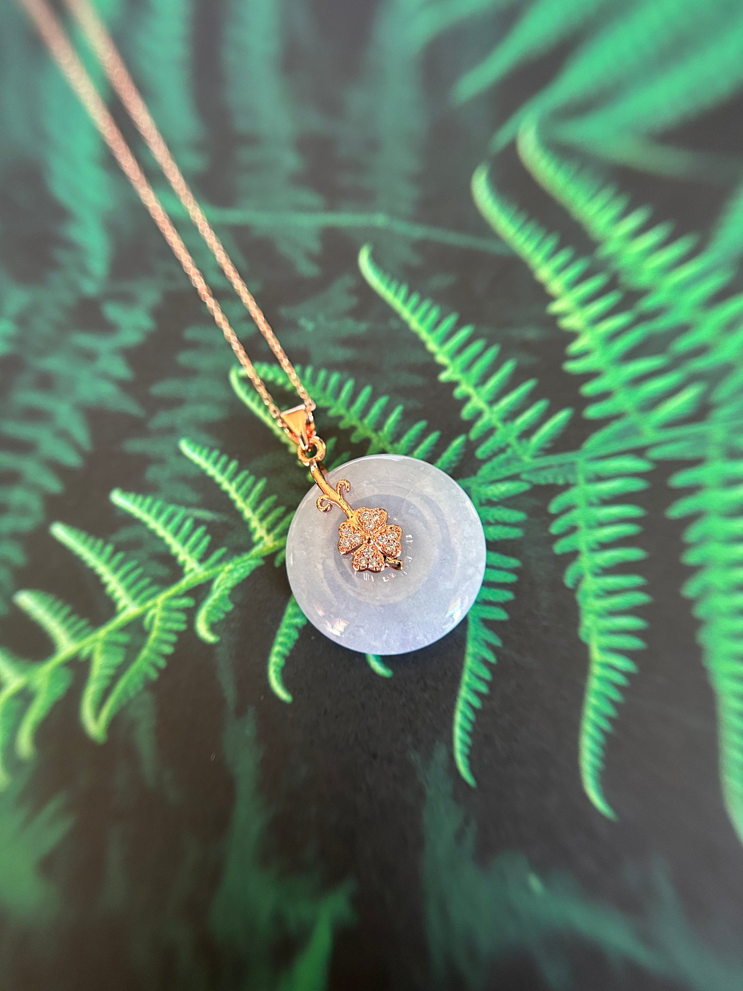 Grade A Natural Burma lavender Jadeite Pi Disc (peng on kou, donut) pendant with a sterling silver, rose gold plated four leaves clover bail